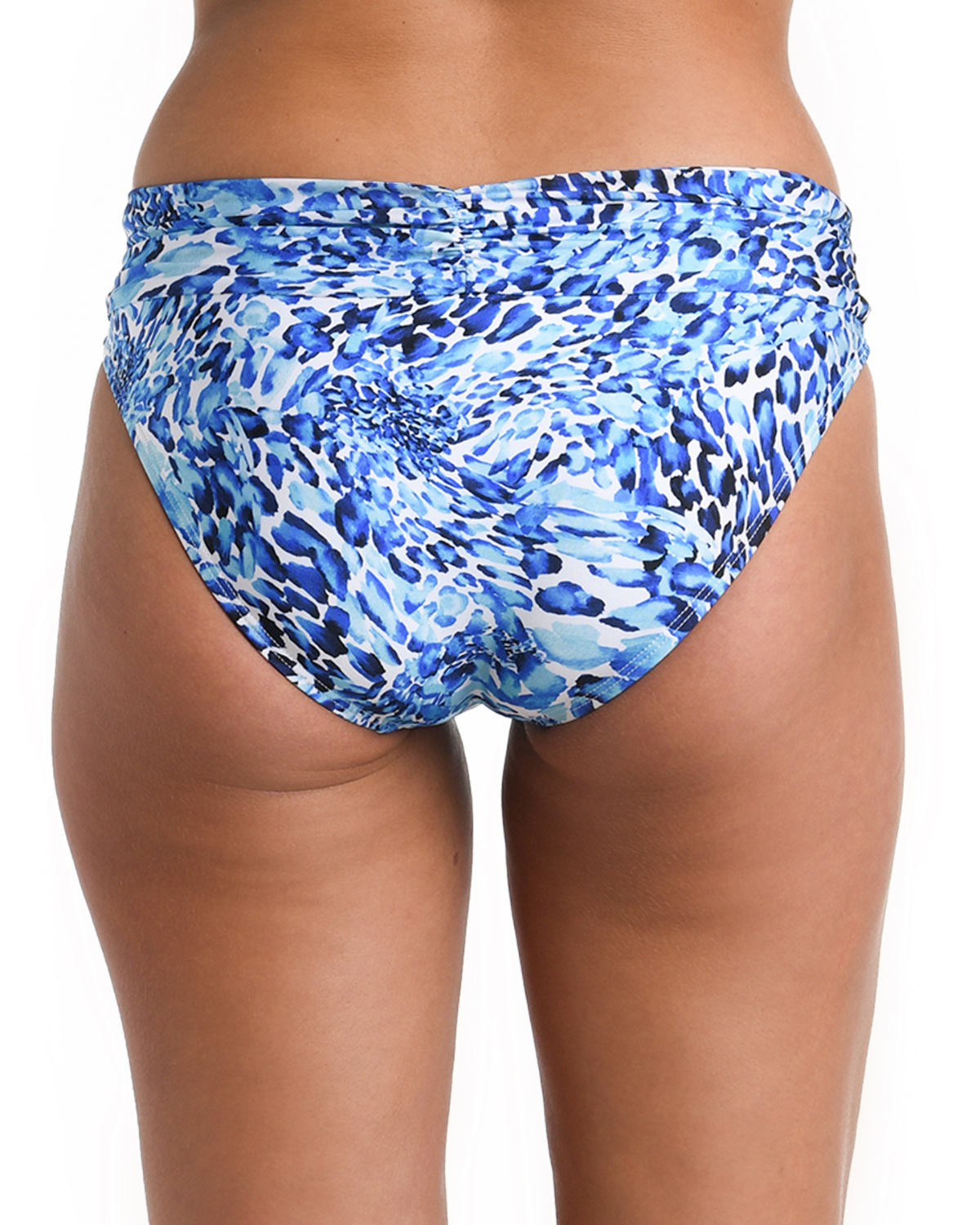 Model wearing a shirred hipster bottom in a blue and white aquatic print