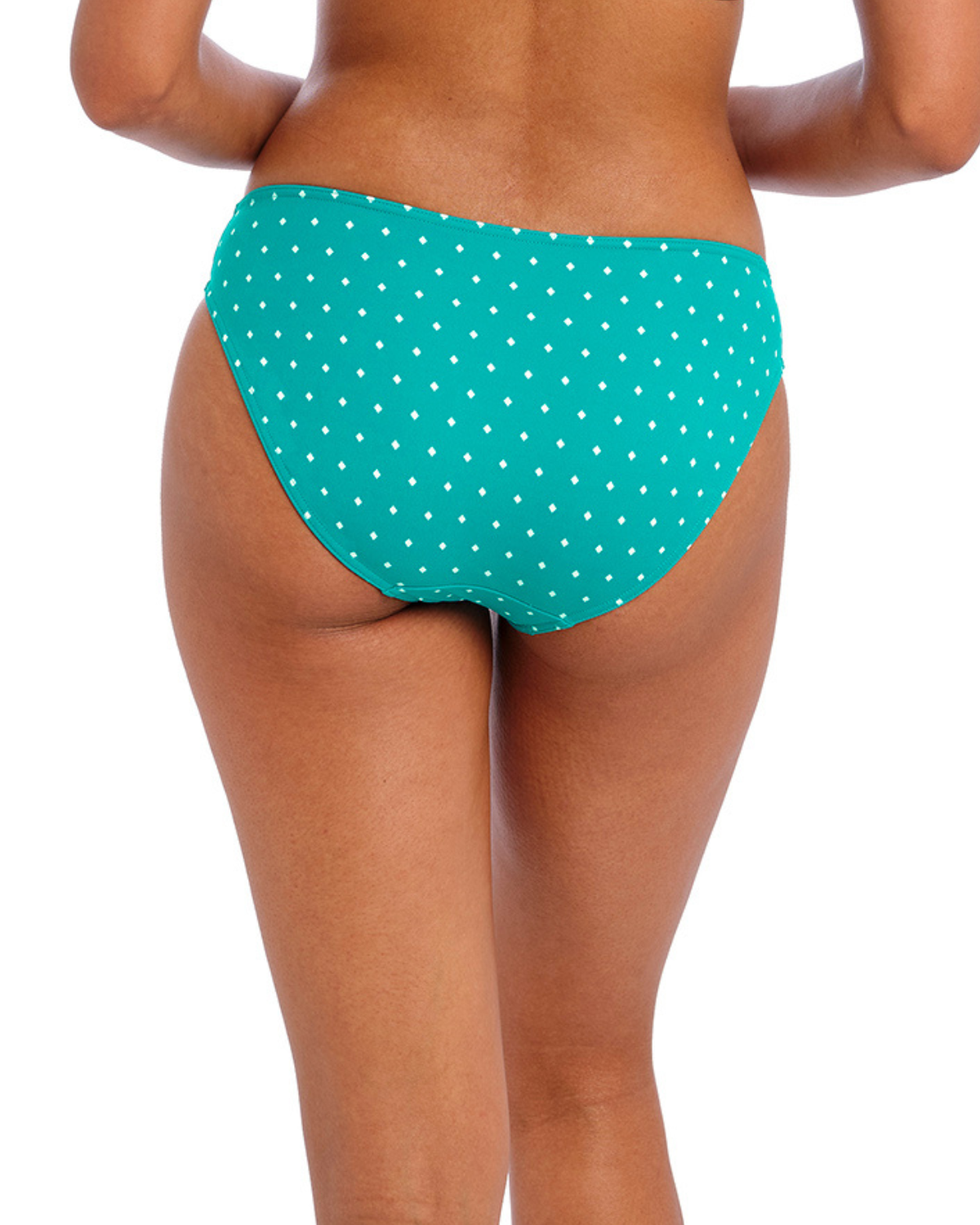 Model wearing a bikini brief bottom in a white dot and turquoise base print