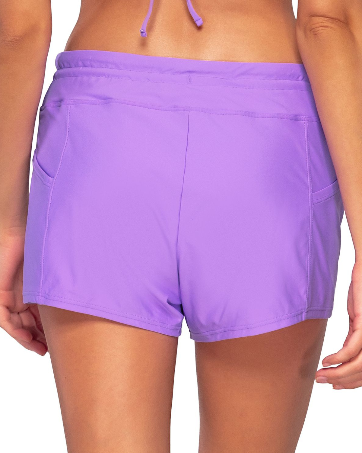 Model wearing a swim short with side pocket in lavender