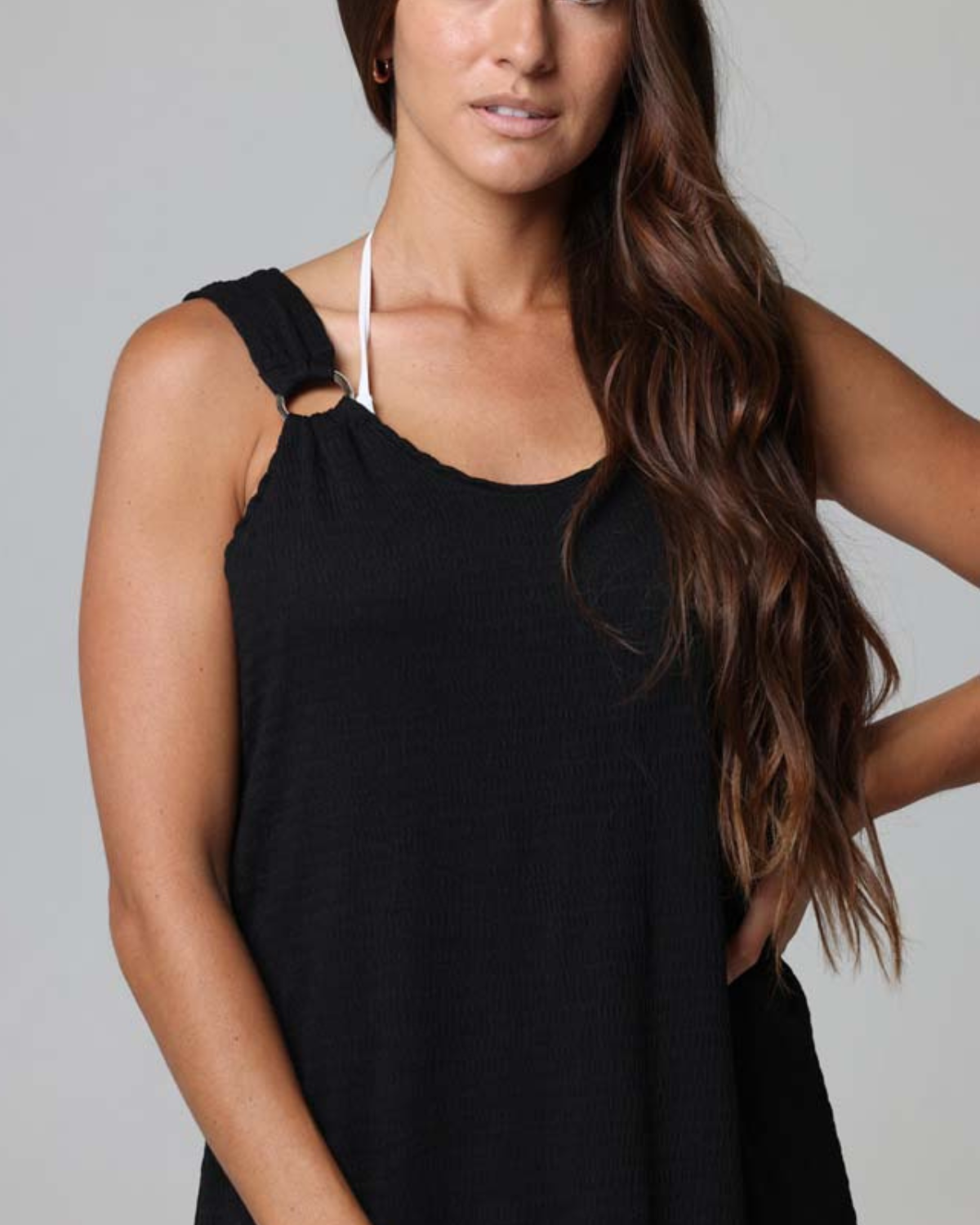 Model wearing a ring tank cover up dress in black