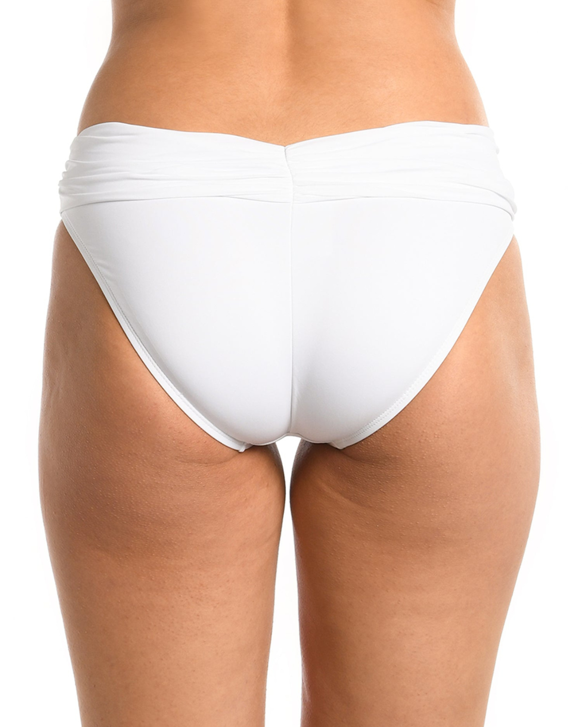 Model wearing a shirred hipster bikini bottom in white