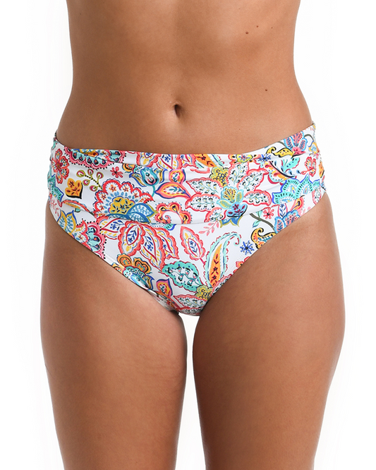 Model wearing a shirred band hipster bottom in a white multicolored gypsy floral print