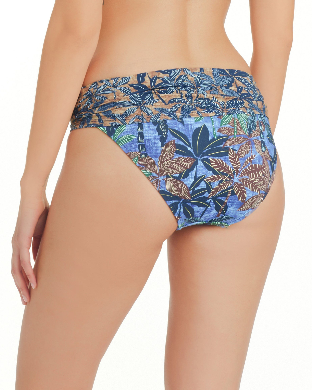 Model wearing a sarong hipster bikini bottom in a navy, brown and green palm frond print