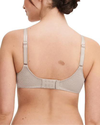 Model wearing a soft cup underwire bra in grey