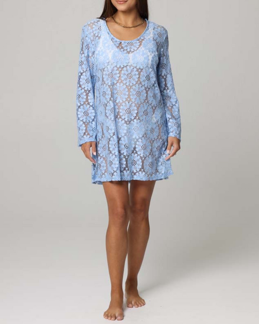 Model wearing a long sleeve crochet cover up dress in blue