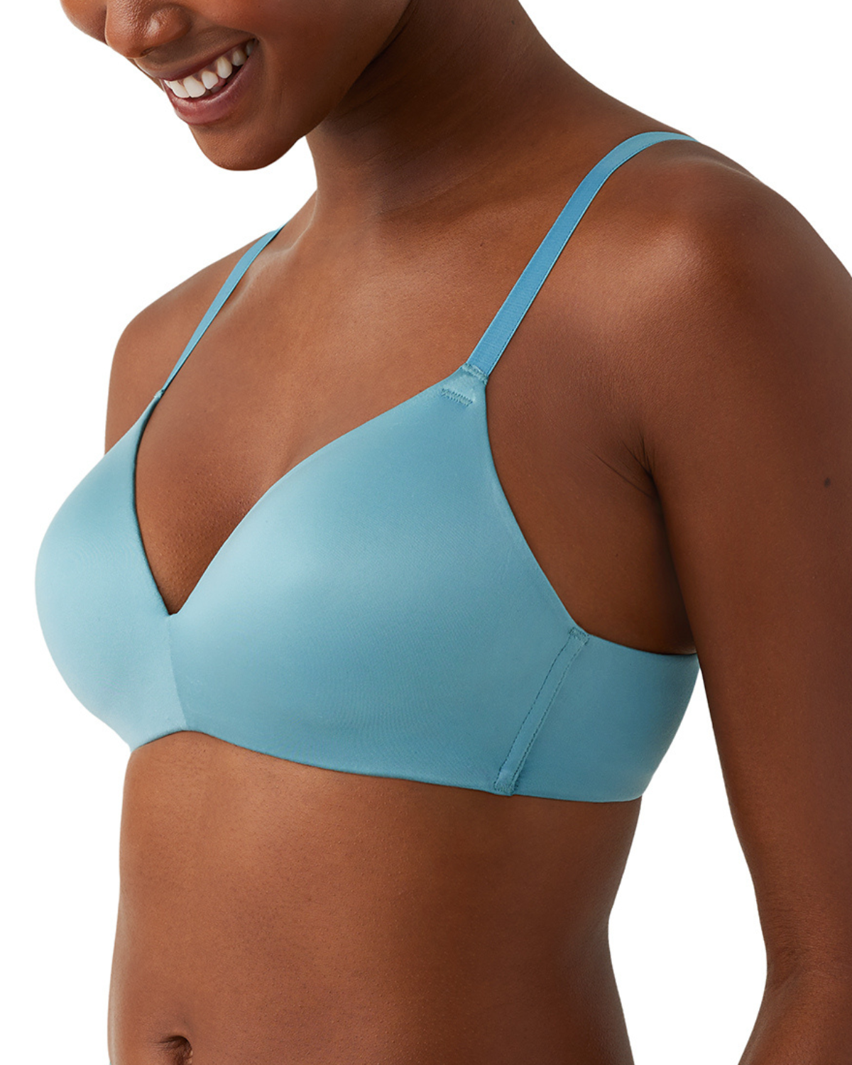 Model wearing a wire free molded bra in light blue