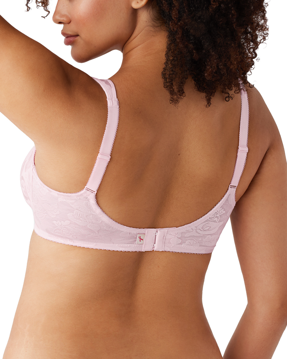 Model wearing a soft cup underwire bra in light pink