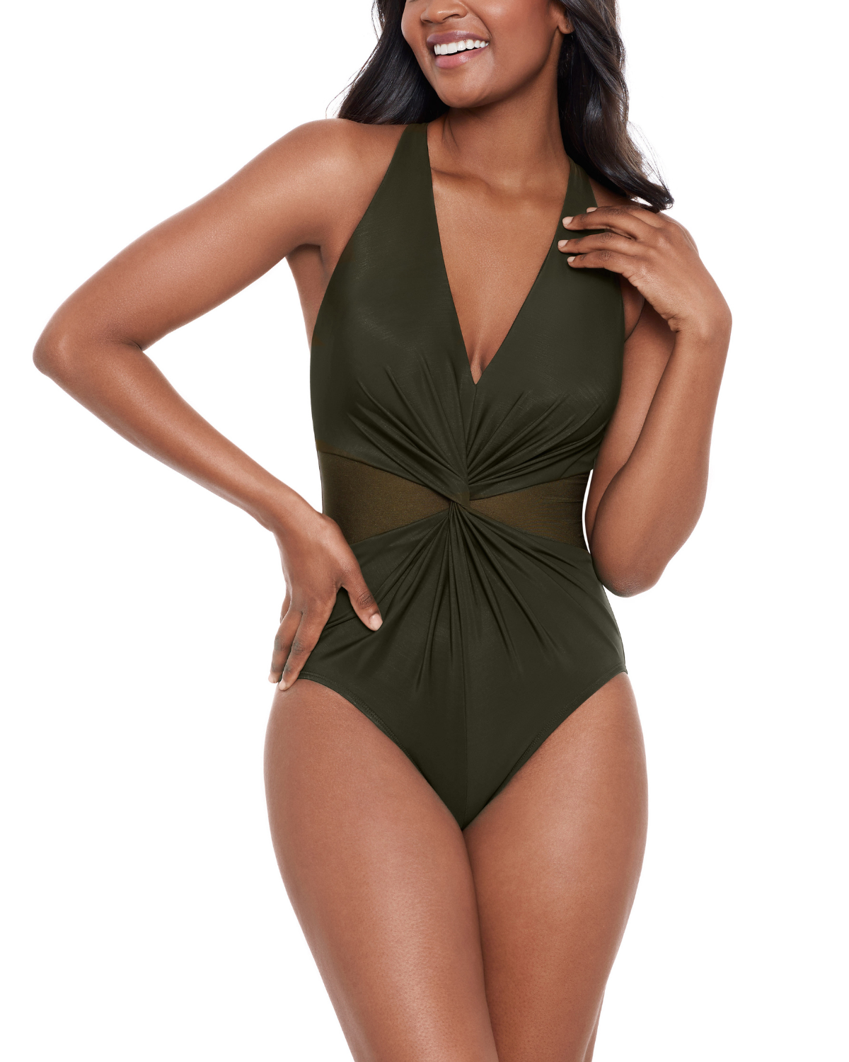 Model wearing a one piece swimsuit with a v neck and twist detail in green