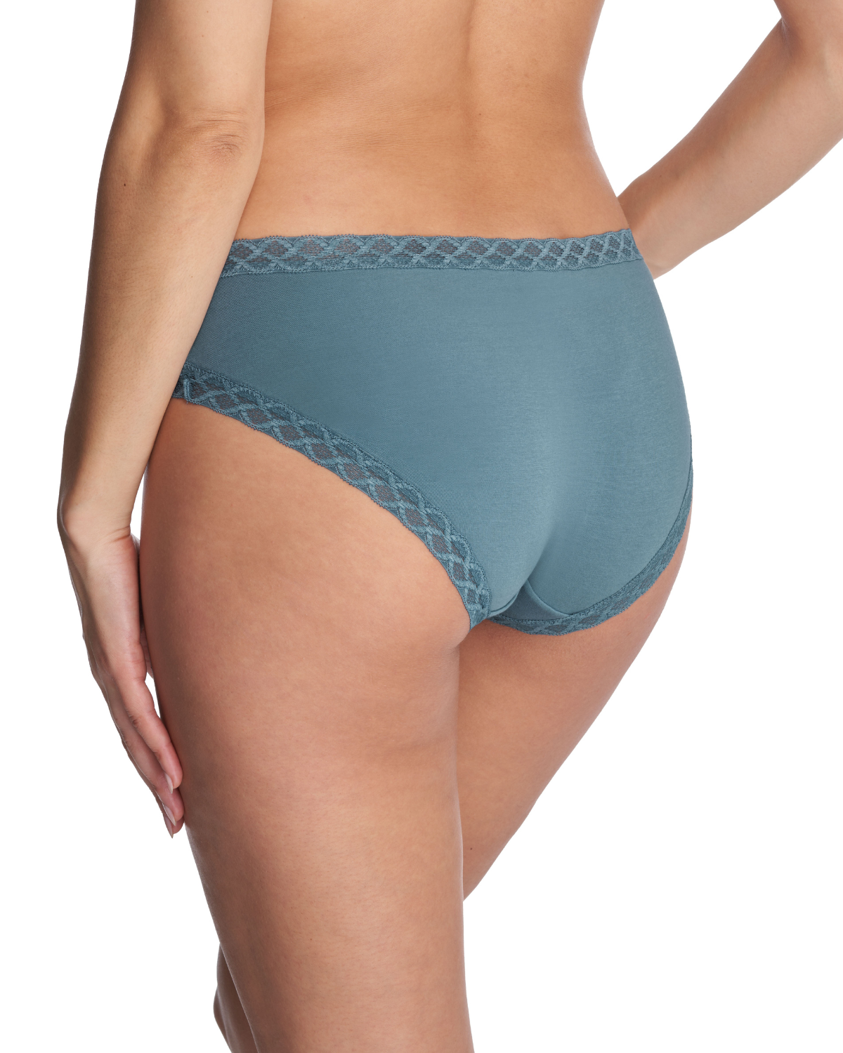 Model wearing a brief panty with lace trim in pale turquoise