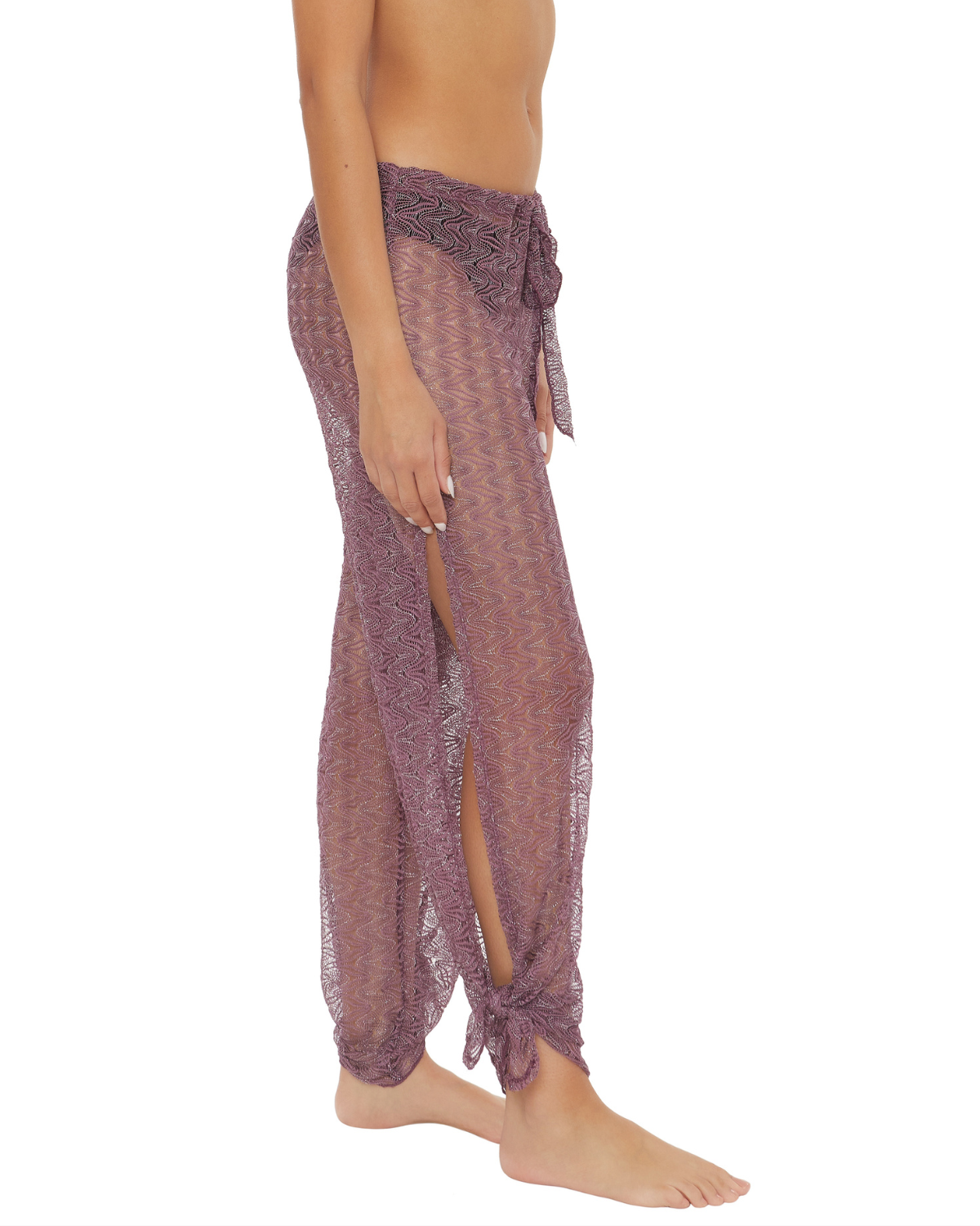 Model wearing a split leg crochet cover up pant in fig