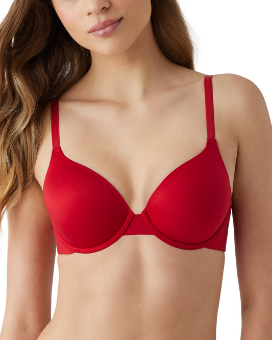 Front view of model on a white backdrop wearing a red underwire t-shirt bra.