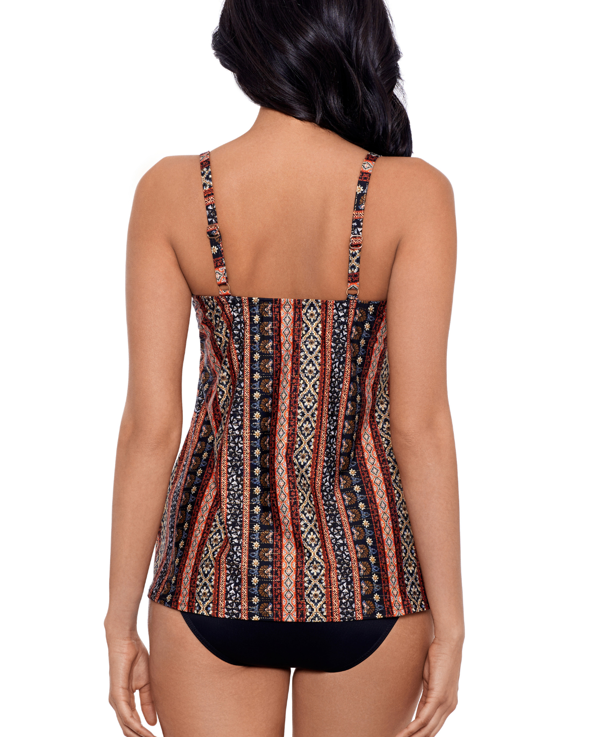 Model wearing a tankini with a sweetheart neckline in brown, red, and black in a striped tribal print