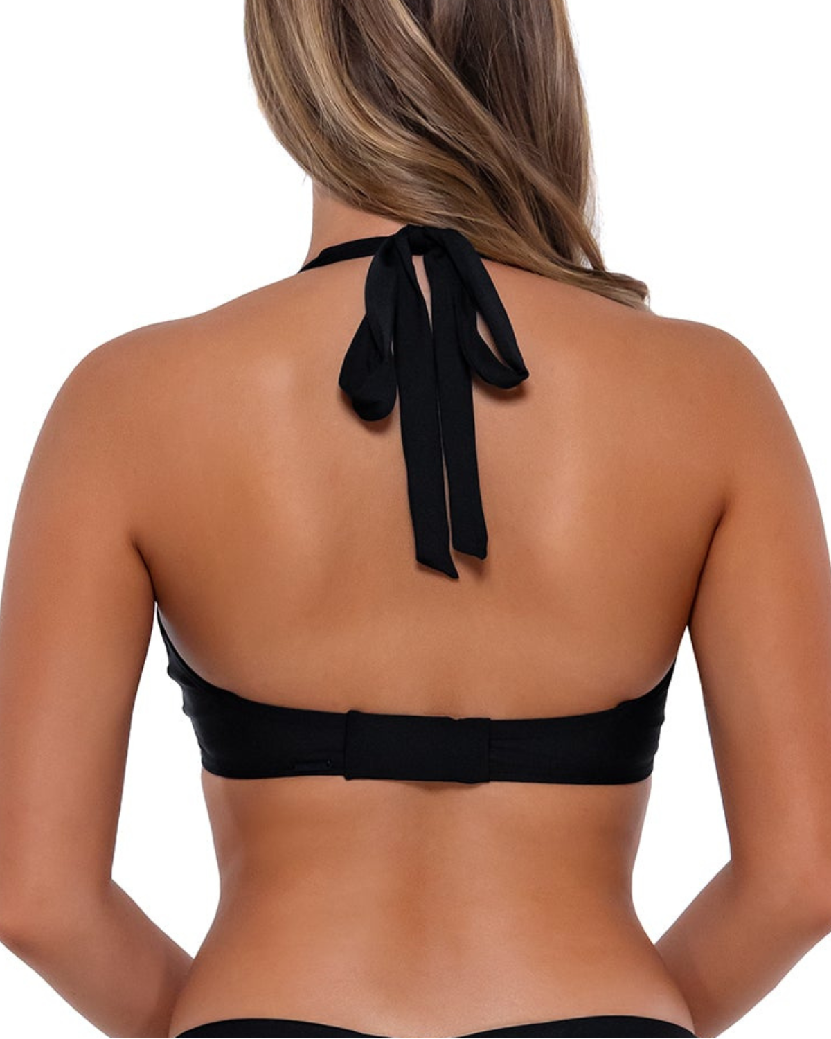 Model wearing a v-wire bikini top with multi-way styling in black. Model is wearing it with halter styling.