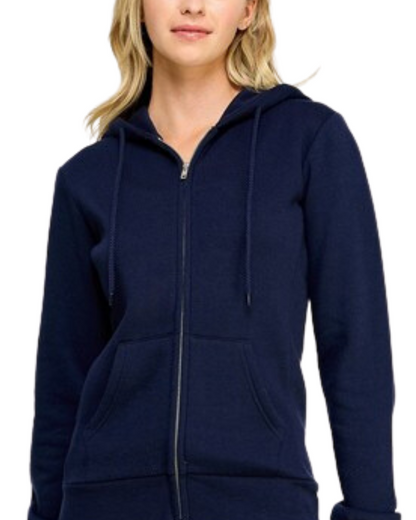 Model on a white backdrop wearing a women's oversized fleece zip up hooded sweater in solid deep navy