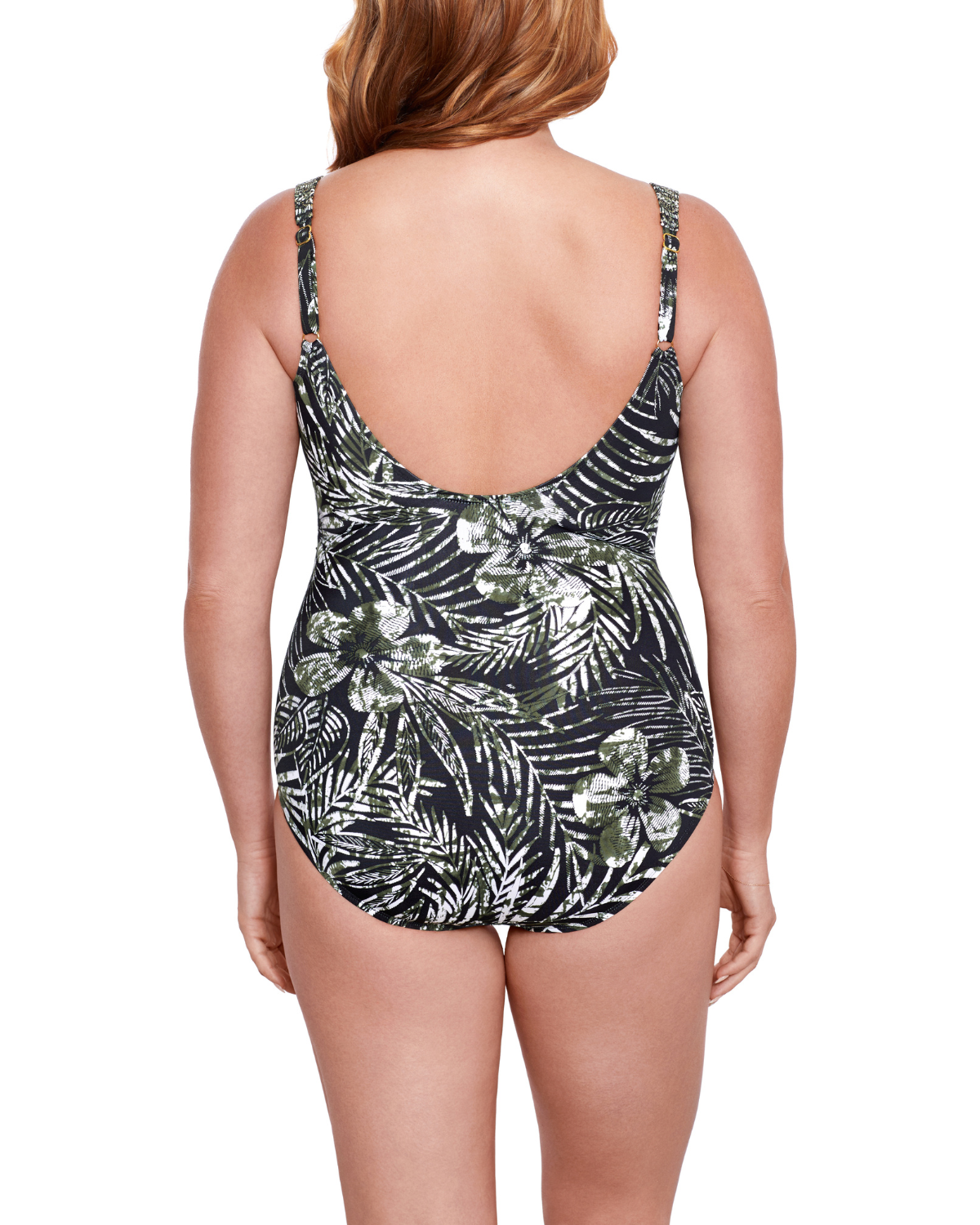 Model wearing a one piece swimsuit with hidden underwire in a black and white abstract floral print