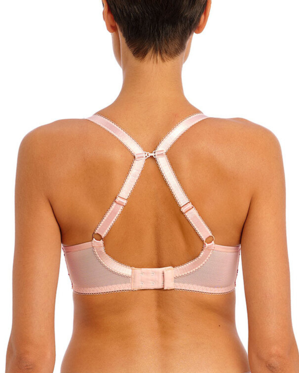 Model wearing a molded spacer underwire bra in pink with lace wings