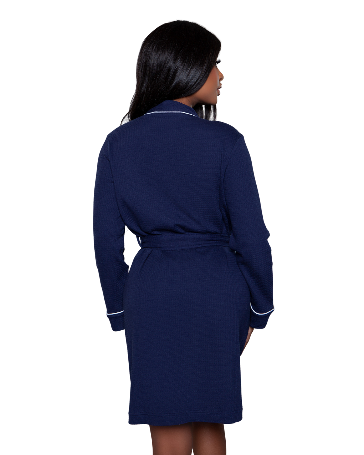 Model wearing a knee length robe in navy with white trim