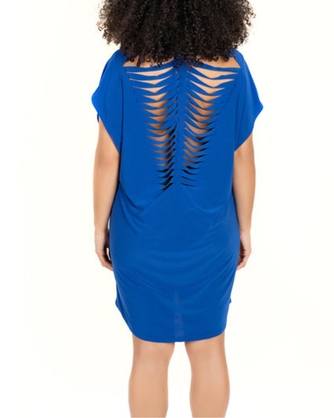 Model wearing a v neck tunic with a cut out back detail in royal blue