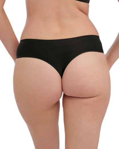 Model wearing a seamless thong in black