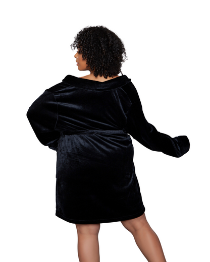 Model wearing a knee length plush robe in black