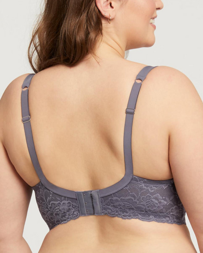 Model wearing a molded t-shirt underwire bra with lace side wings in grey