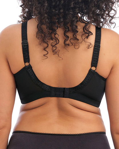 Model wearing a soft cup wire free bra in black