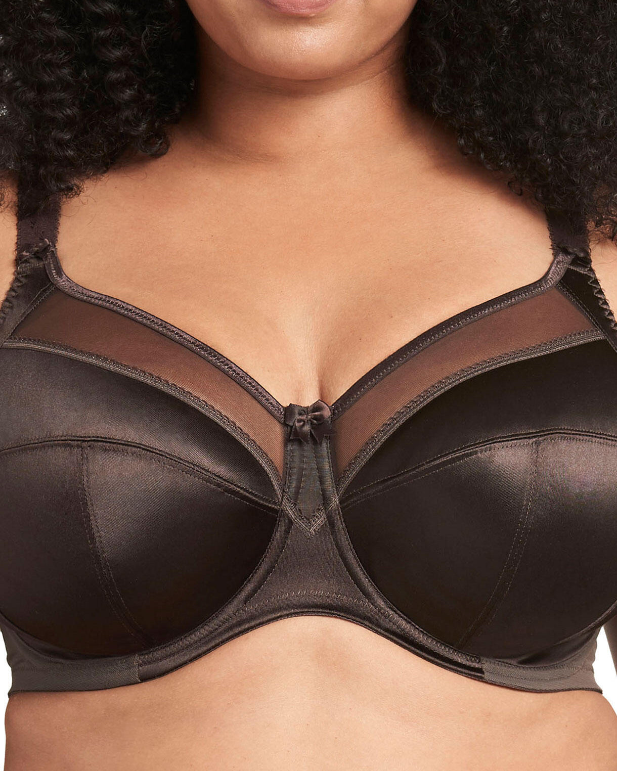Model wearing a cut and sew underwire banded bra in chocolate brown
