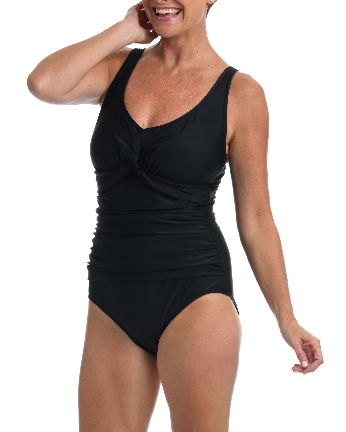 Model wearing a one piece swimsuit with a twist front detail in black