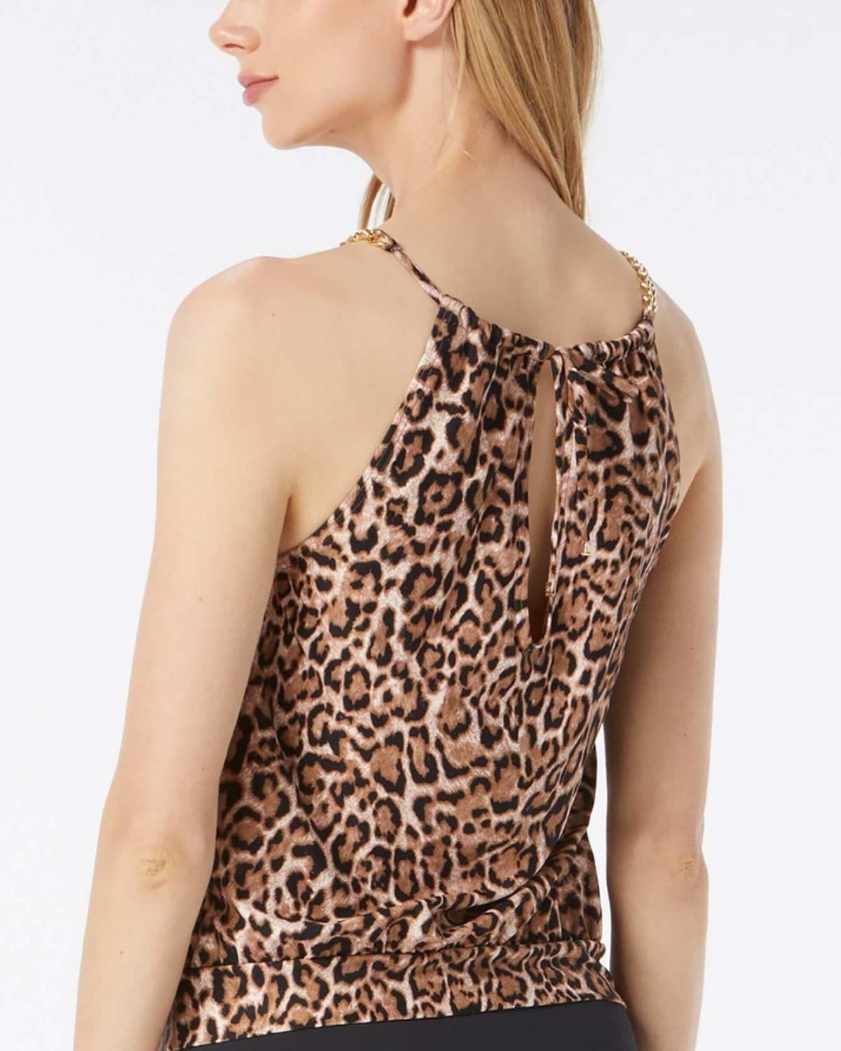 Model wearing a high neck blouson tankini top in a cheetah print