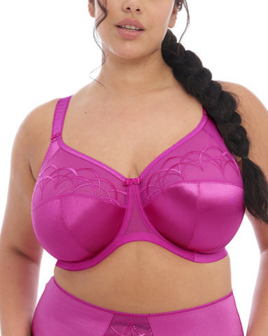 Model wearing a soft cup underwire bra in fuchsia pink