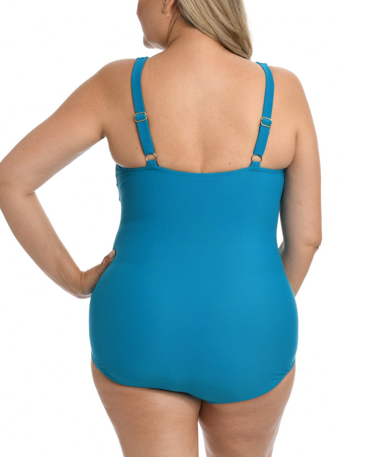 Model wearing a one piece swimsuit with a twist detail in emerald