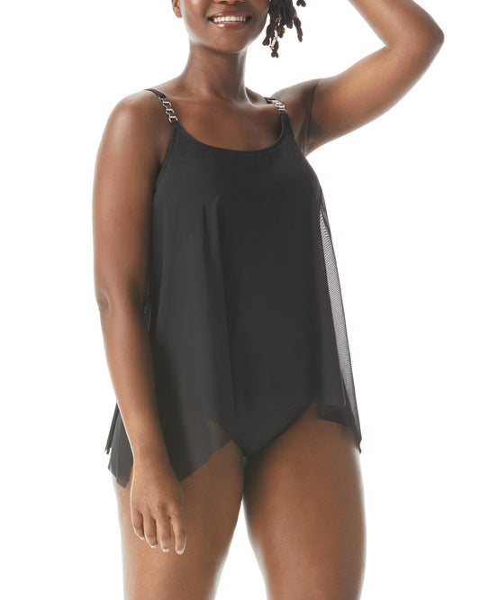 Model wearing a tankini top with underwire in black