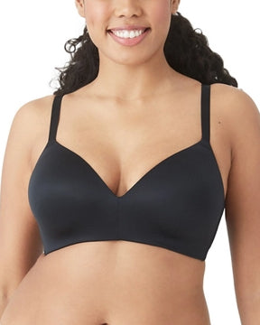 Model wearing a molded wire-free t-shirt bra with lace wings in black