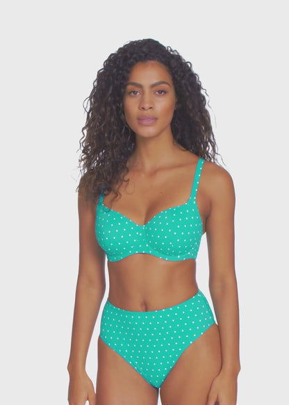 Model turning 360 degrees wearing a underwire sweetheart bikini top in a white dot and turquoise base print