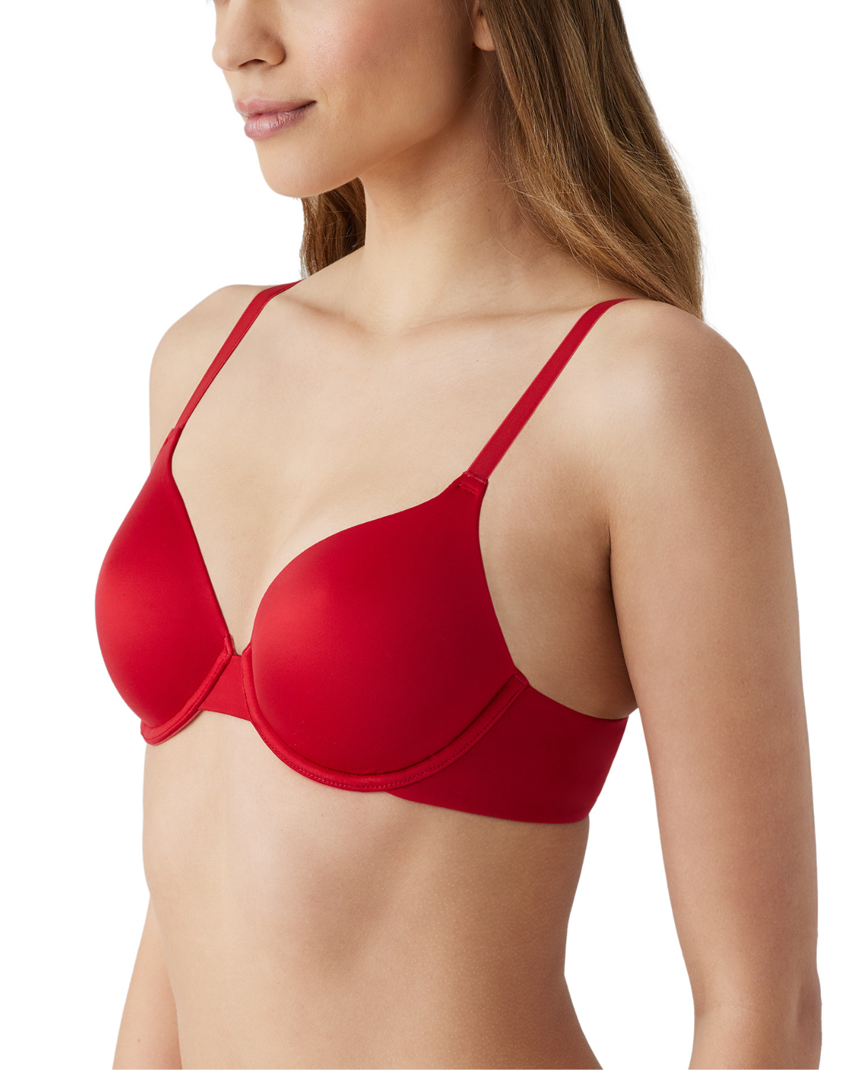 Side view of model on a white backdrop wearing a red underwire t-shirt bra.