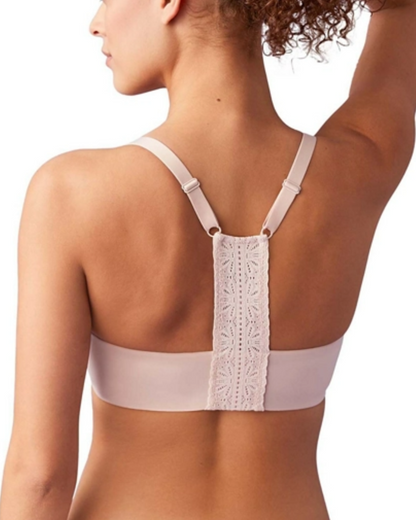 Model wearing a molded underwire front-closure t-shirt bra with a lace t-back and adjustable straps in light pink